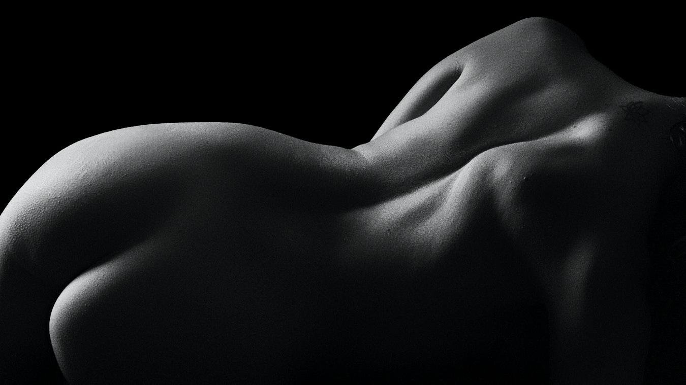 Abstract black-and-white boudoir study of shape and light